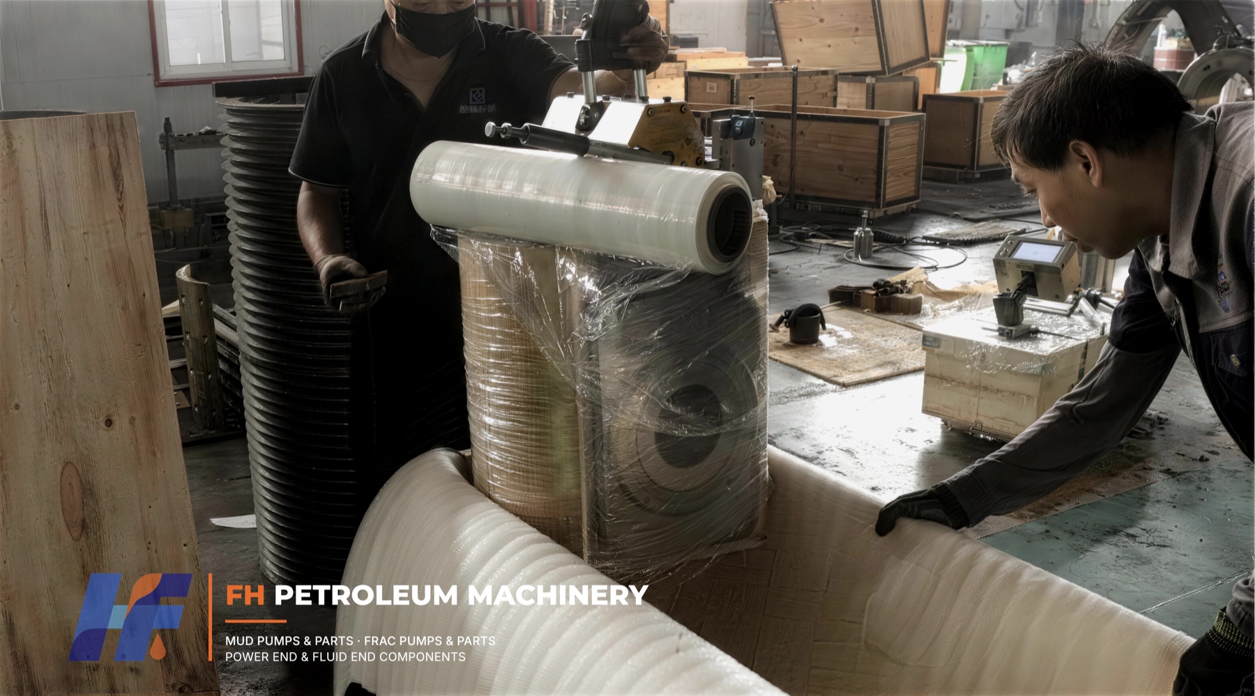 Completed mud pump crosshead assembly being packed for shipment