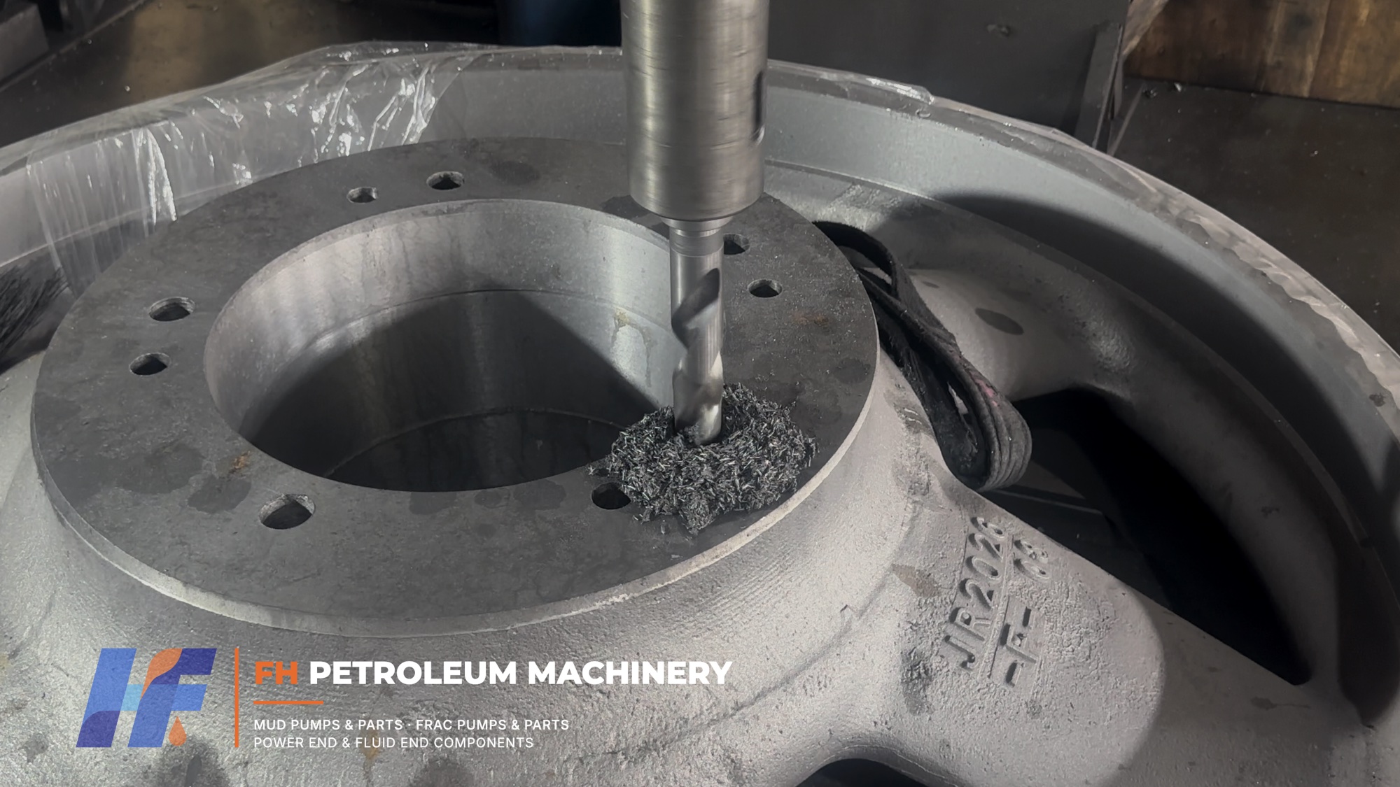 Precision machining of mounting holes on a mud pump belt pulley